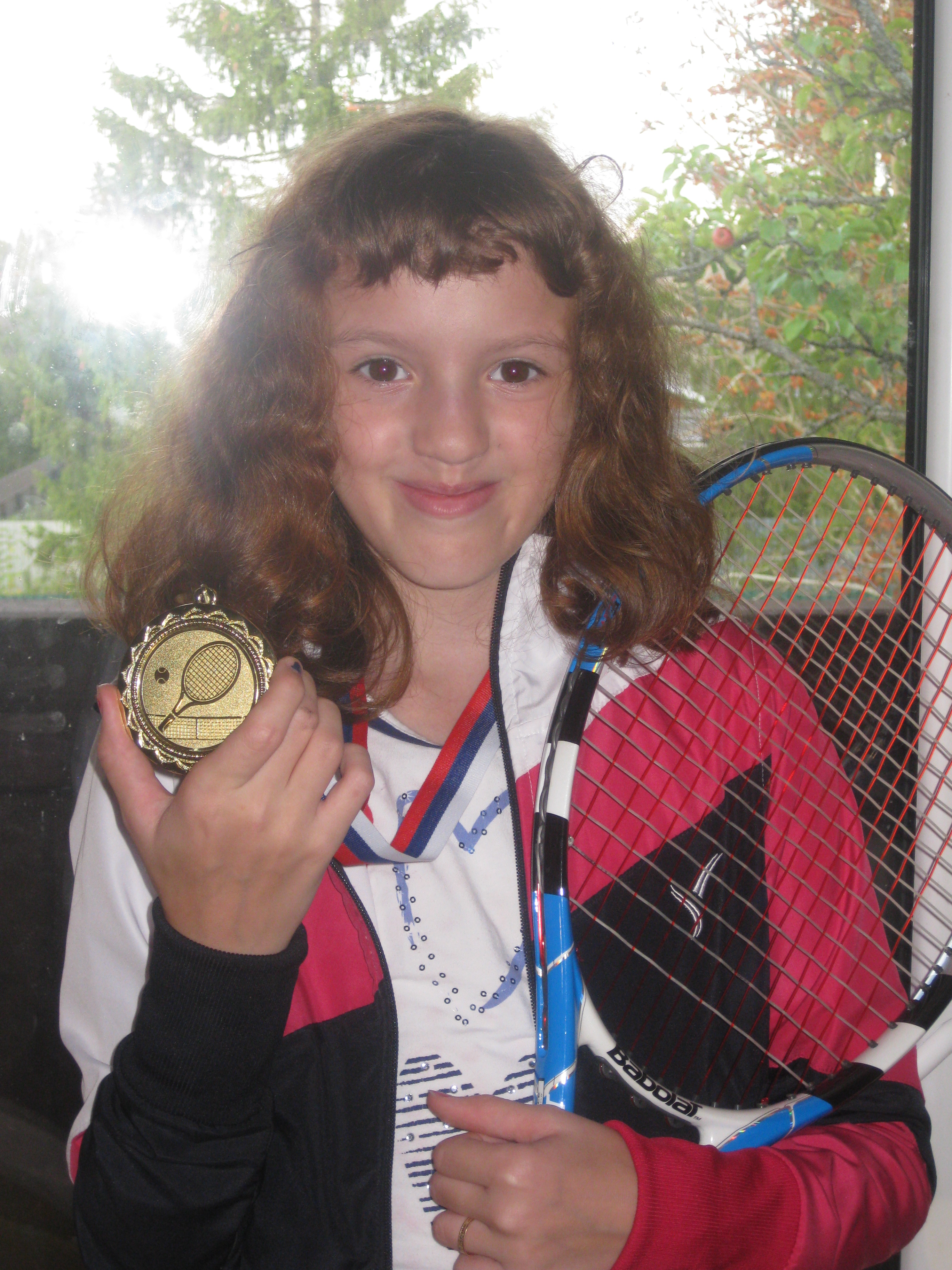 Теннисистка! Два выигранных турнира и три серебра до 13 лет.